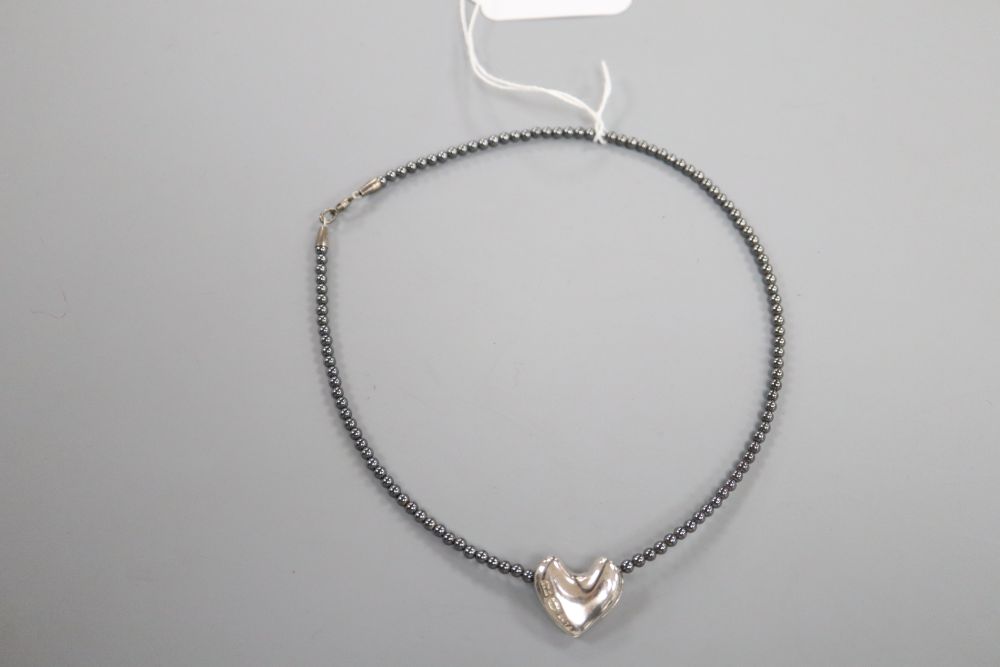 Allan Scharff for Georg Jensen, a sterling silver heart pendant on hematite bead necklace,